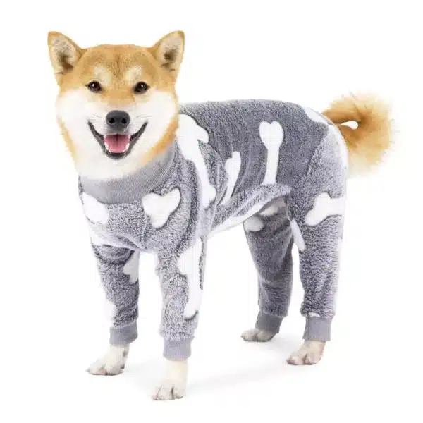 a dog wearing a gray pajamas