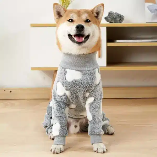 a dog wearing a gray pajamas